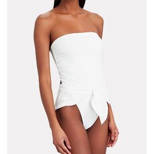 Never worn ivory tie waist one piece bathing suit.